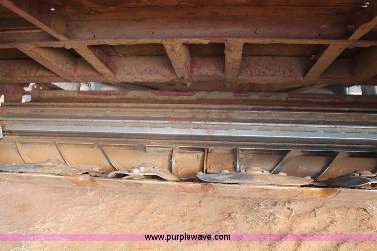 image for item H1611 2013 MacDon M205 self-propelled windrower