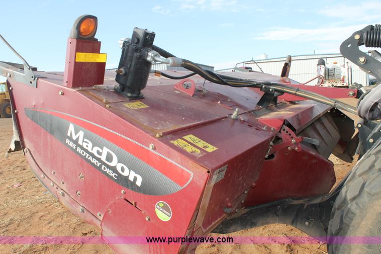image for item H1611 2013 MacDon M205 self-propelled windrower