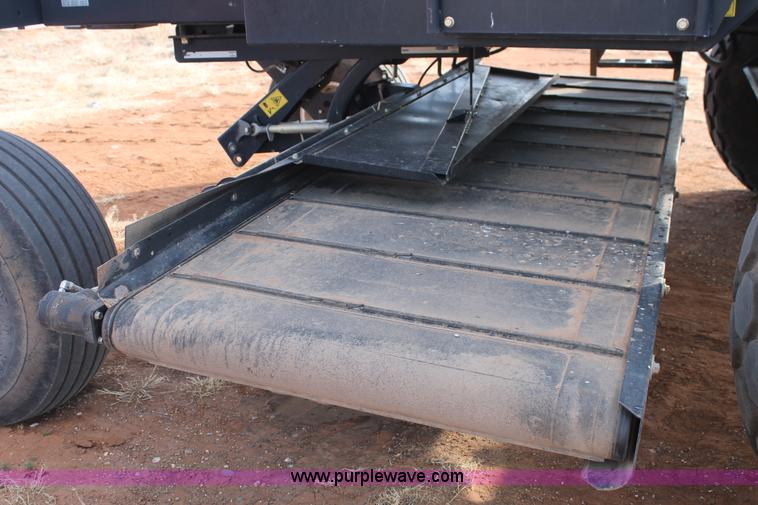 image for item H1611 2013 MacDon M205 self-propelled windrower