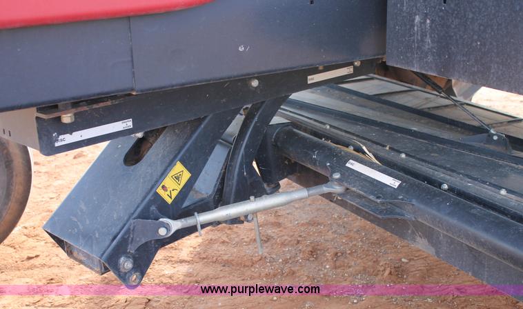 image for item H1611 2013 MacDon M205 self-propelled windrower