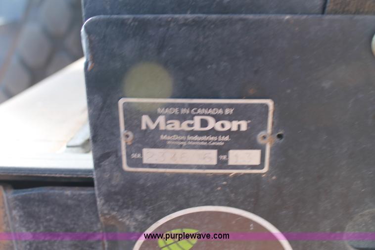 image for item H1611 2013 MacDon M205 self-propelled windrower
