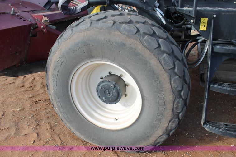 image for item H1611 2013 MacDon M205 self-propelled windrower