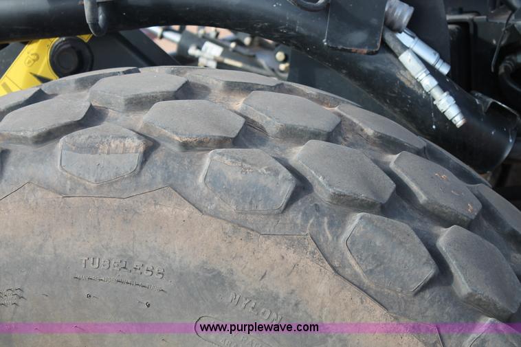 image for item H1611 2013 MacDon M205 self-propelled windrower