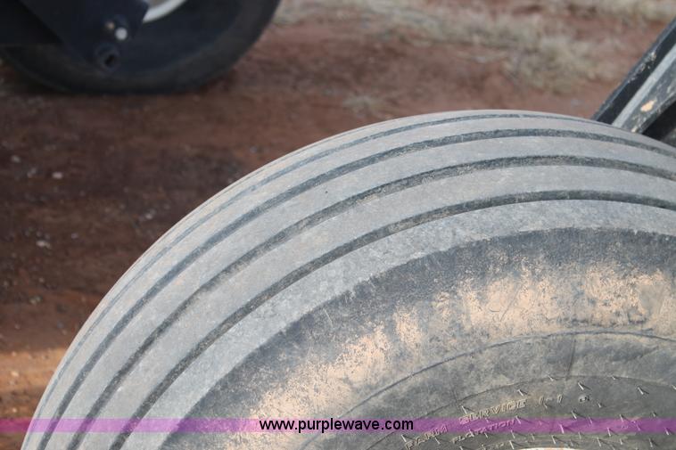 image for item H1611 2013 MacDon M205 self-propelled windrower