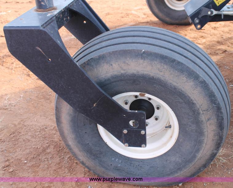 image for item H1611 2013 MacDon M205 self-propelled windrower