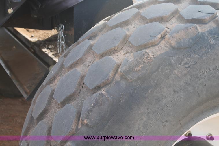 image for item H1611 2013 MacDon M205 self-propelled windrower