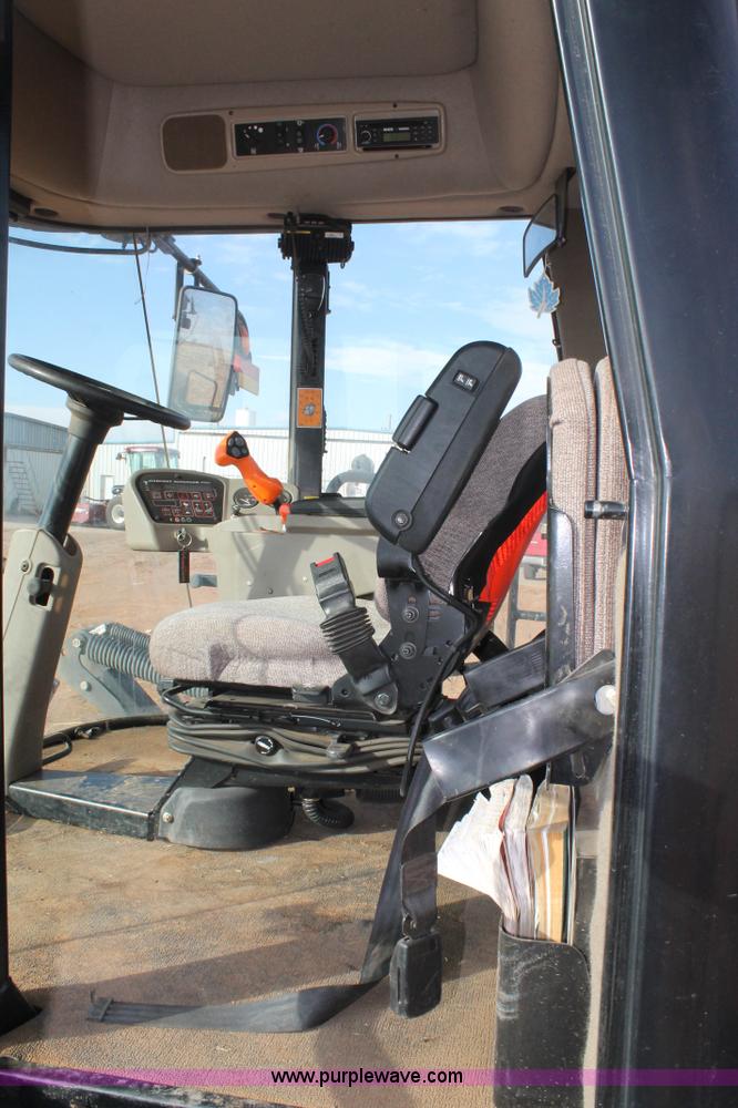 image for item H1611 2013 MacDon M205 self-propelled windrower