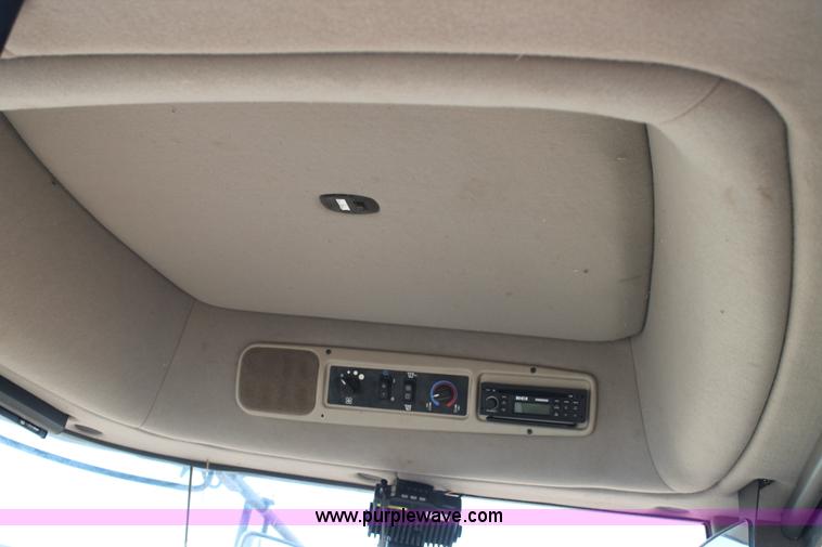 image for item H1611 2013 MacDon M205 self-propelled windrower