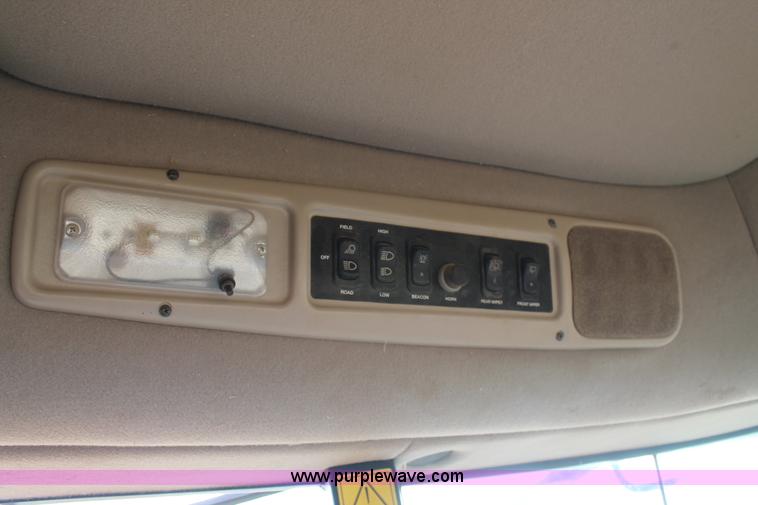 image for item H1611 2013 MacDon M205 self-propelled windrower