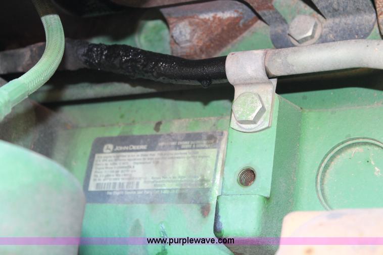 image for item H1612 2006 John Deere 9520 4WD tractor