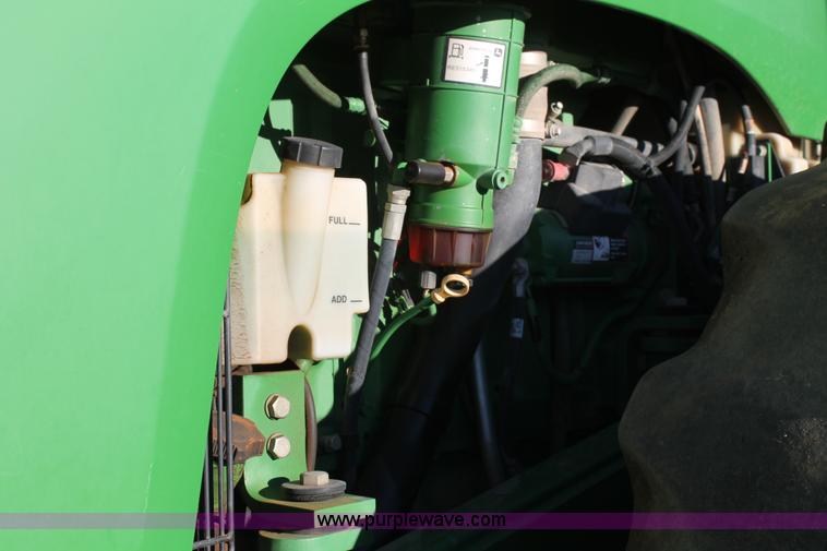 image for item H1612 2006 John Deere 9520 4WD tractor