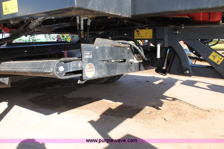 image for item H1617 2013 MacDon M205 self-propelled windrower