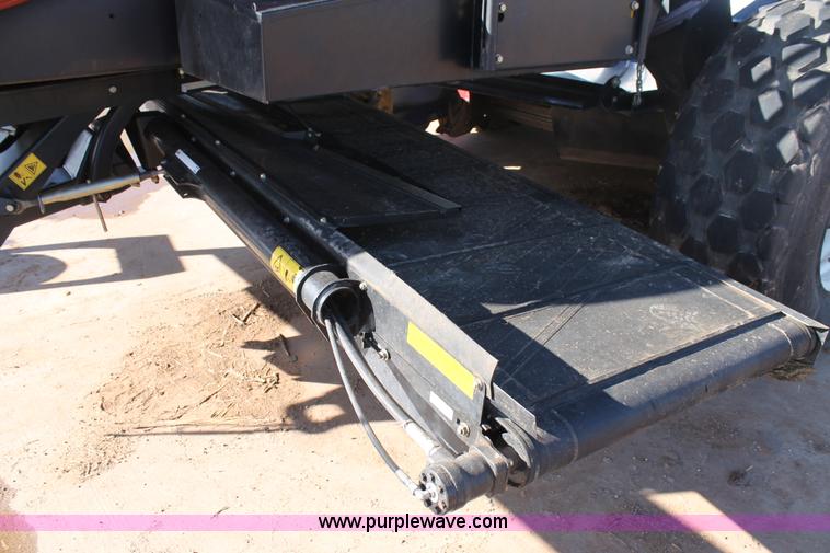 image for item H1617 2013 MacDon M205 self-propelled windrower