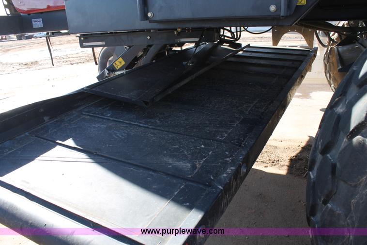 image for item H1617 2013 MacDon M205 self-propelled windrower