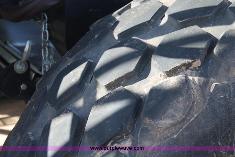 image for item H1617 2013 MacDon M205 self-propelled windrower