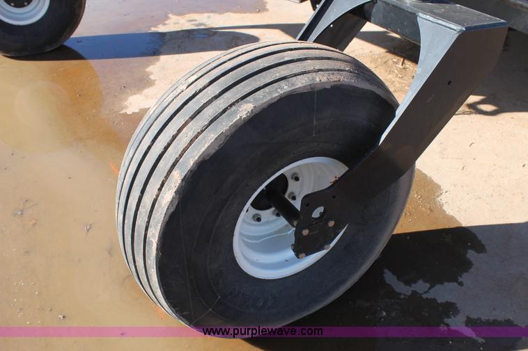 image for item H1617 2013 MacDon M205 self-propelled windrower