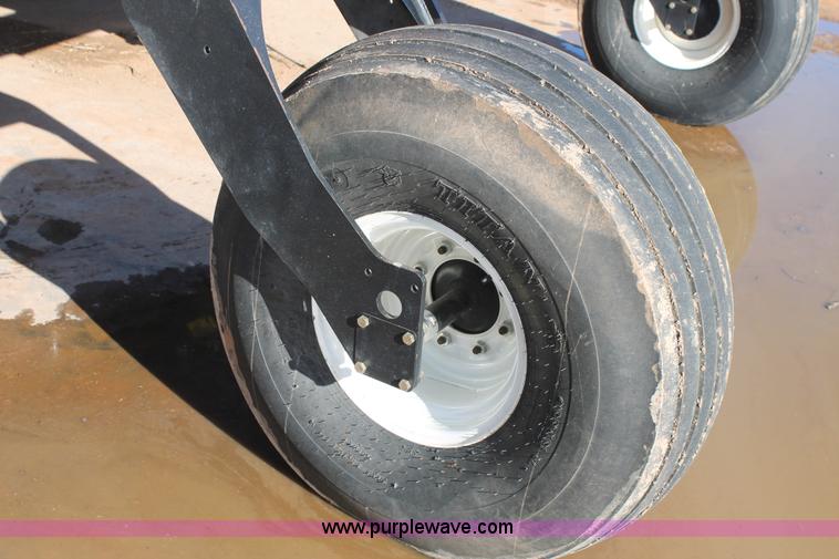 image for item H1617 2013 MacDon M205 self-propelled windrower