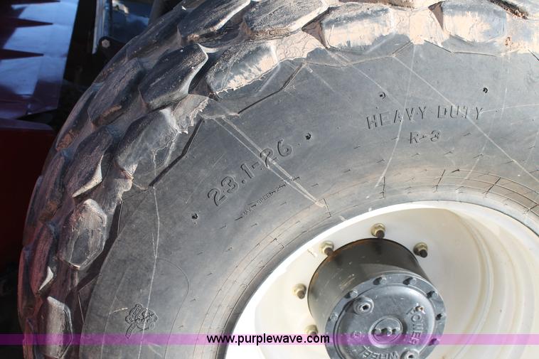 image for item H1617 2013 MacDon M205 self-propelled windrower