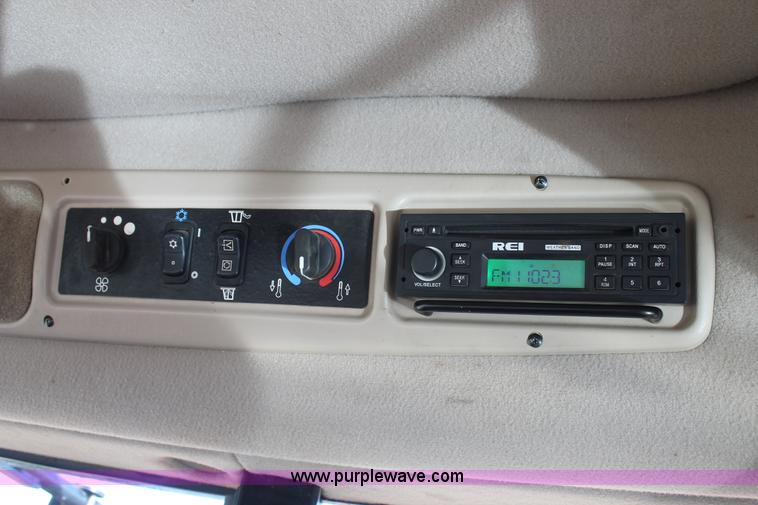 image for item H1617 2013 MacDon M205 self-propelled windrower