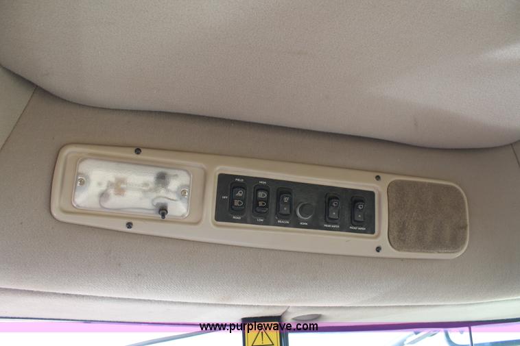 image for item H1617 2013 MacDon M205 self-propelled windrower