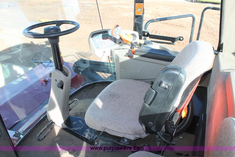 image for item H1617 2013 MacDon M205 self-propelled windrower