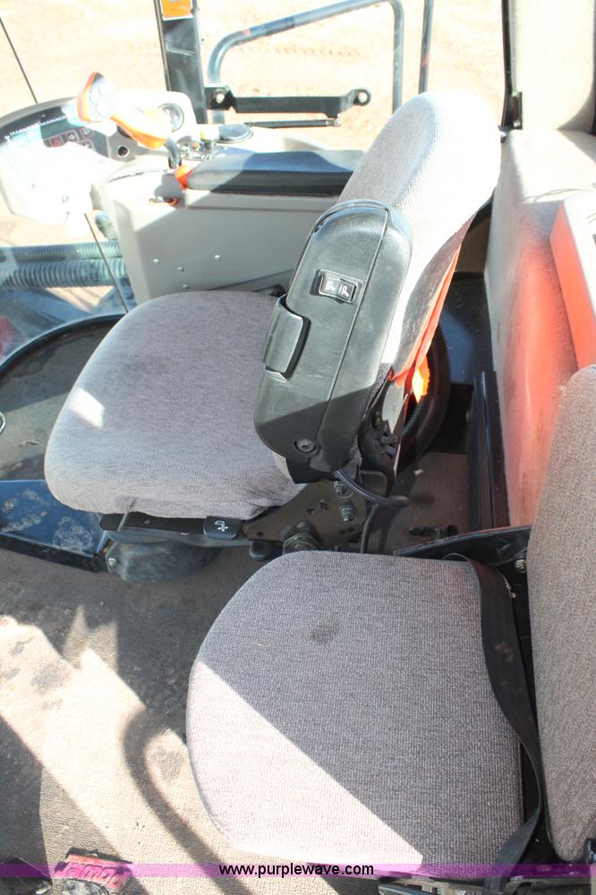 image for item H1617 2013 MacDon M205 self-propelled windrower