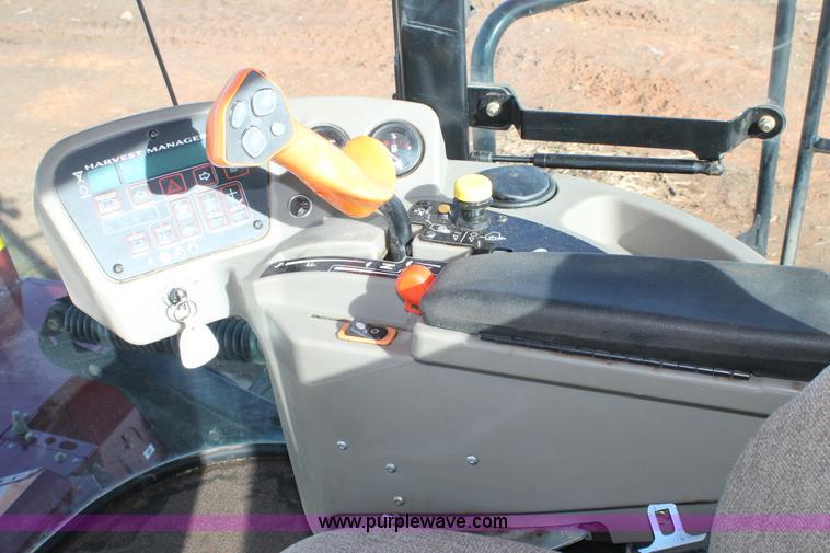 image for item H1617 2013 MacDon M205 self-propelled windrower