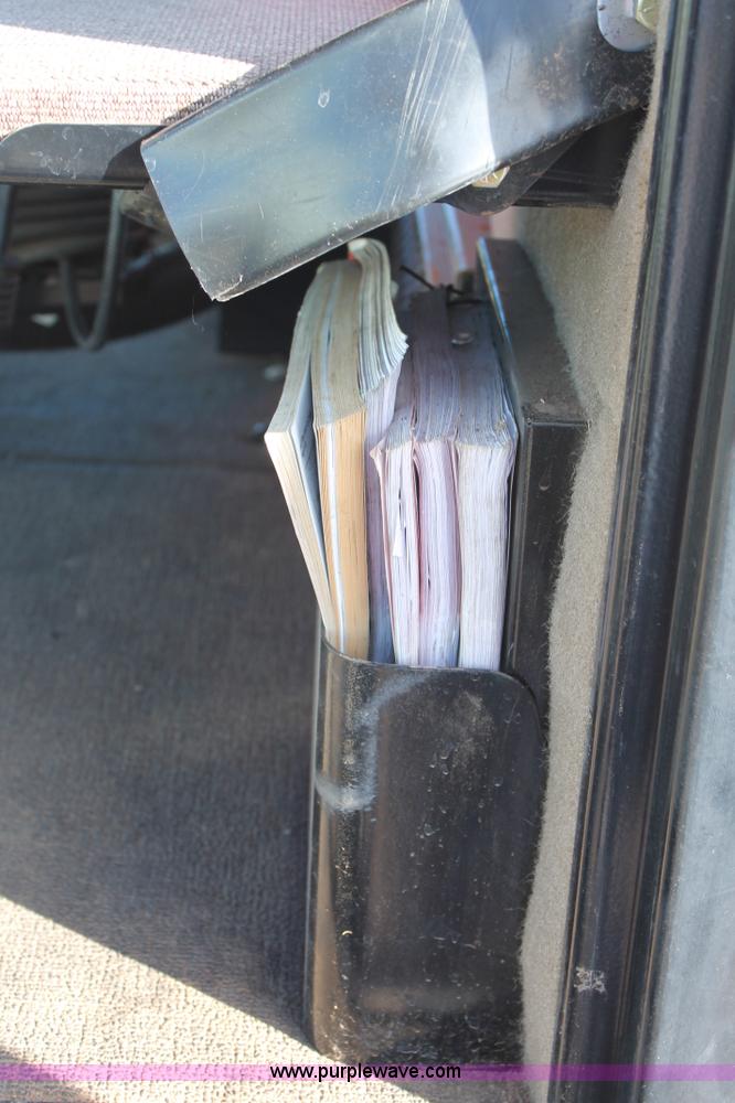 image for item H1617 2013 MacDon M205 self-propelled windrower