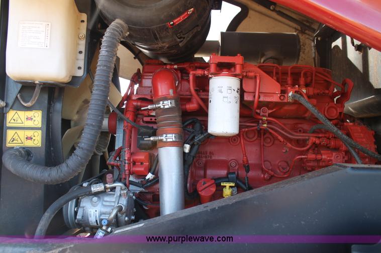 image for item H1617 2013 MacDon M205 self-propelled windrower