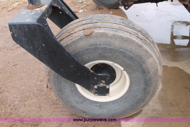 image for item L4250 2013 MacDon M205 self-propelled windrower