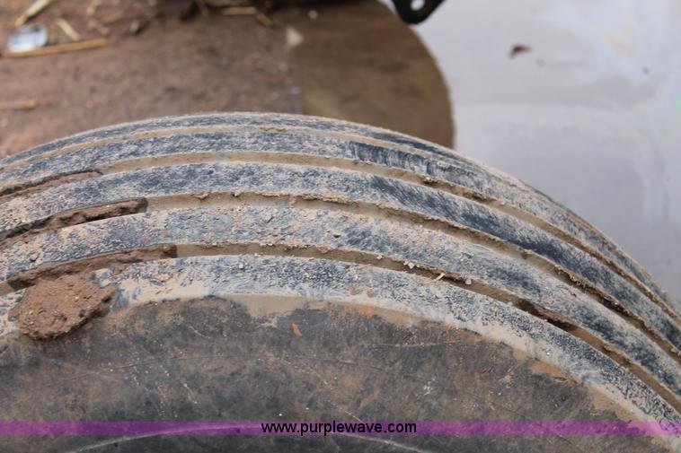 image for item L4250 2013 MacDon M205 self-propelled windrower