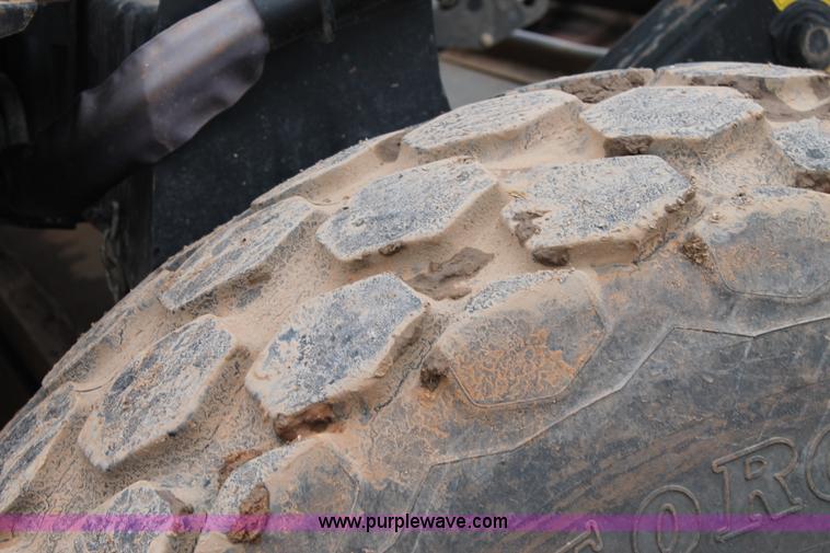 image for item L4250 2013 MacDon M205 self-propelled windrower