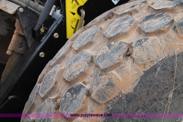 image for item L4250 2013 MacDon M205 self-propelled windrower