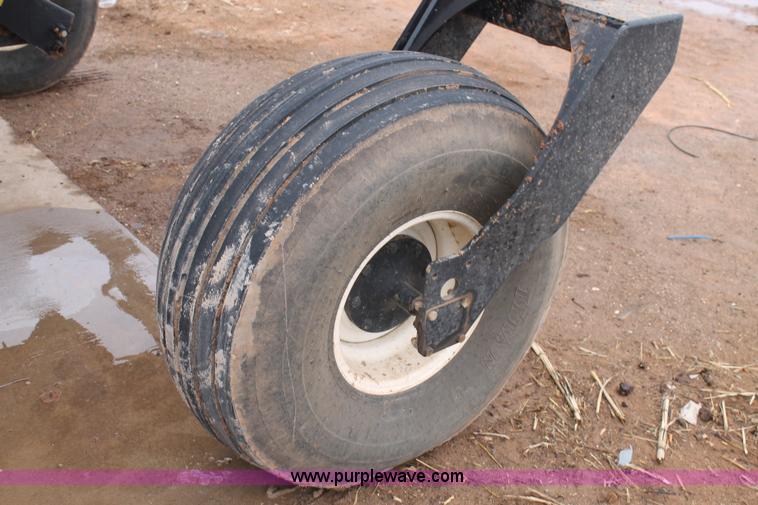 image for item L4250 2013 MacDon M205 self-propelled windrower