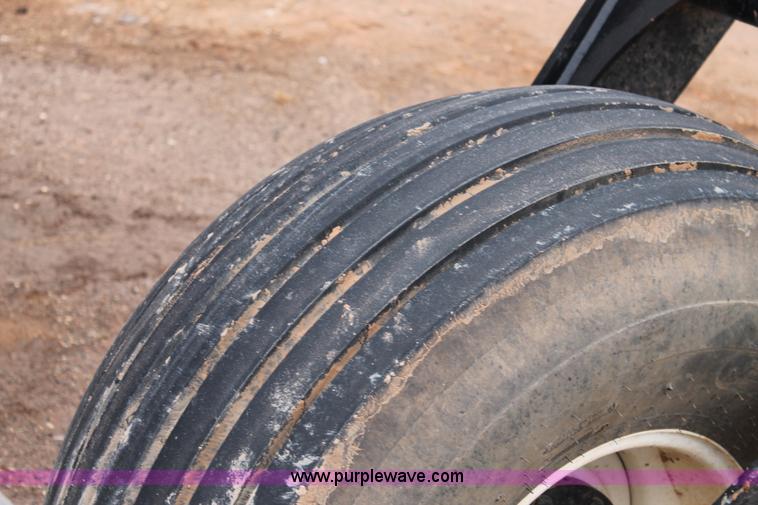 image for item L4250 2013 MacDon M205 self-propelled windrower