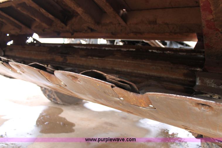 image for item L4250 2013 MacDon M205 self-propelled windrower