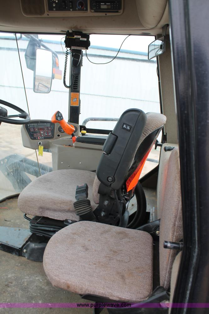 image for item L4250 2013 MacDon M205 self-propelled windrower