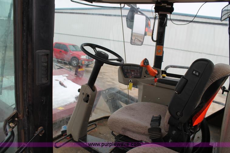 image for item L4250 2013 MacDon M205 self-propelled windrower