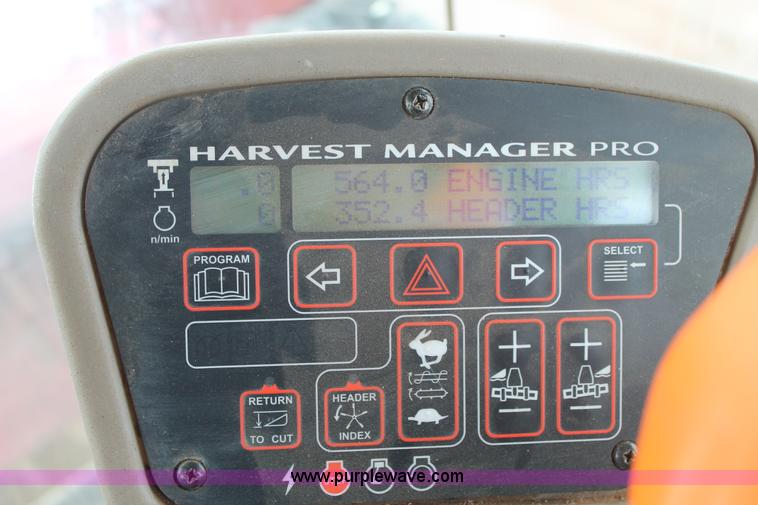 image for item L4250 2013 MacDon M205 self-propelled windrower