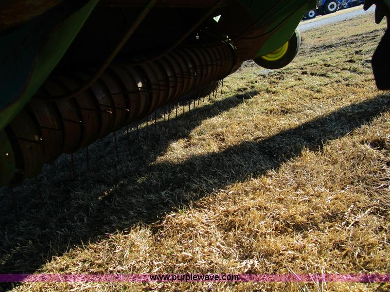 image for item D2311 1995 John Deere 535 round baler