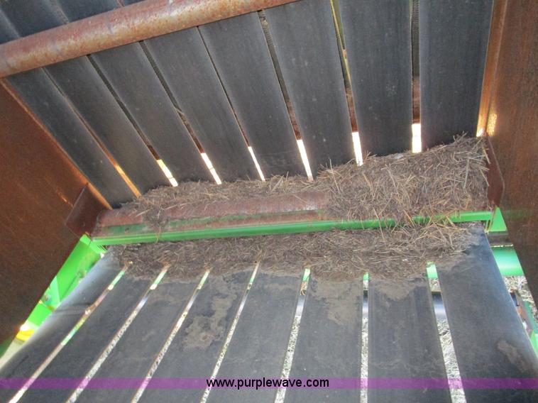 image for item D2311 1995 John Deere 535 round baler