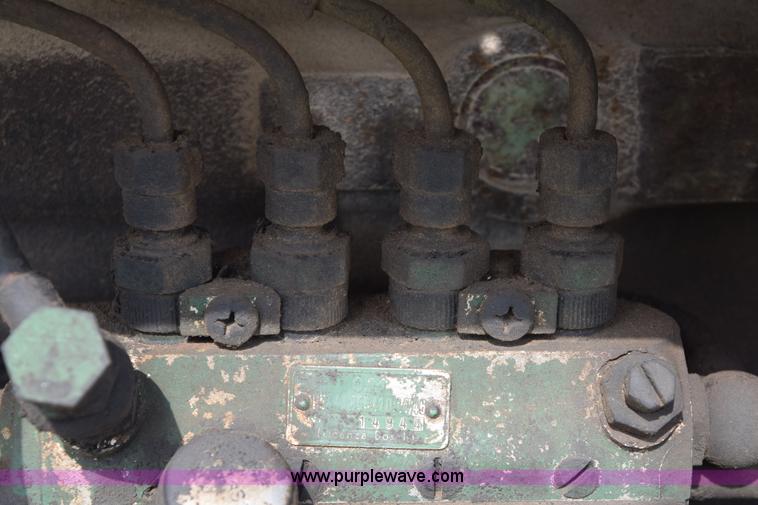 image for item E6250 Oliver 1450 tractor