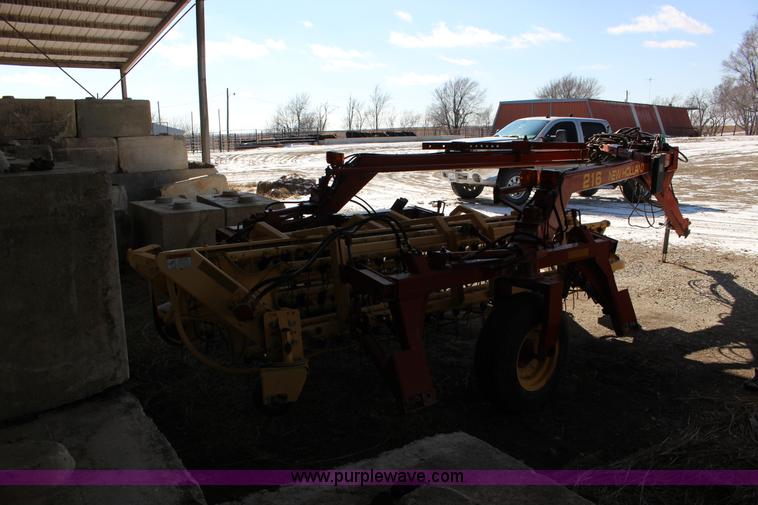 image for item L6655 New Holland 216 twin hay rake
