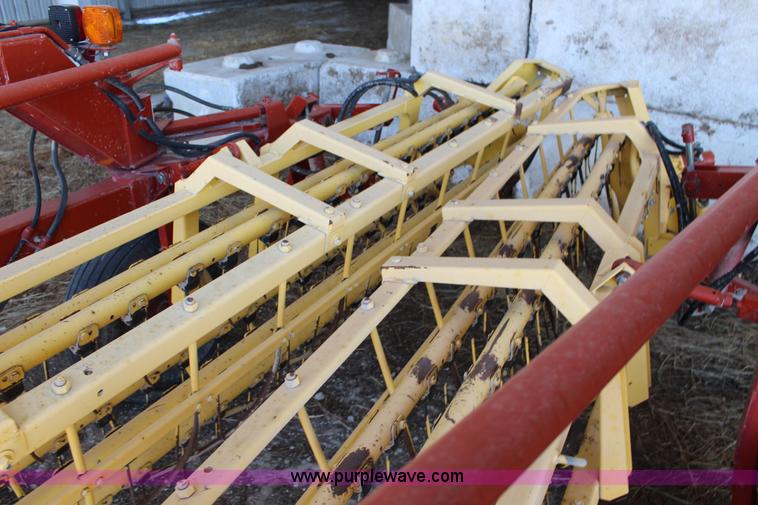 image for item L6655 New Holland 216 twin hay rake
