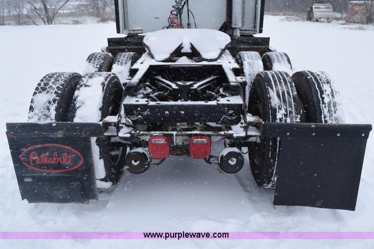 image for item E6253 2000 Kenworth T600 semi truck