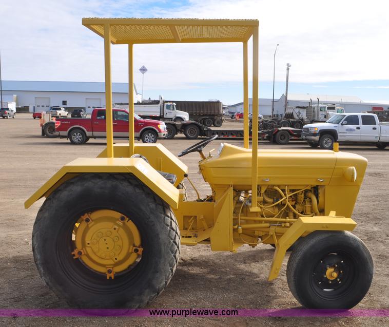 image for item F2235 Ford tow tractor