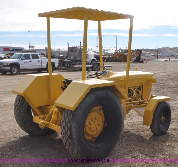 image for item F2235 Ford tow tractor