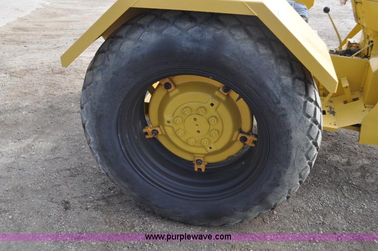 image for item F2235 Ford tow tractor