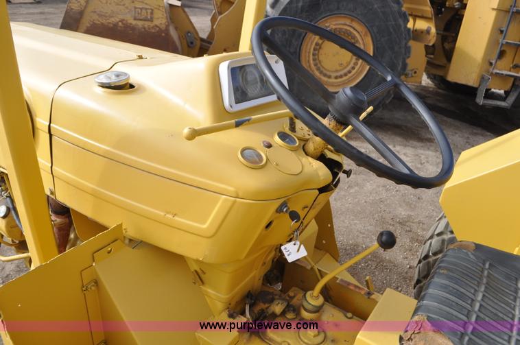 image for item F2235 Ford tow tractor