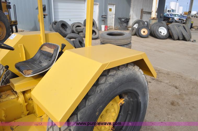 image for item F2235 Ford tow tractor